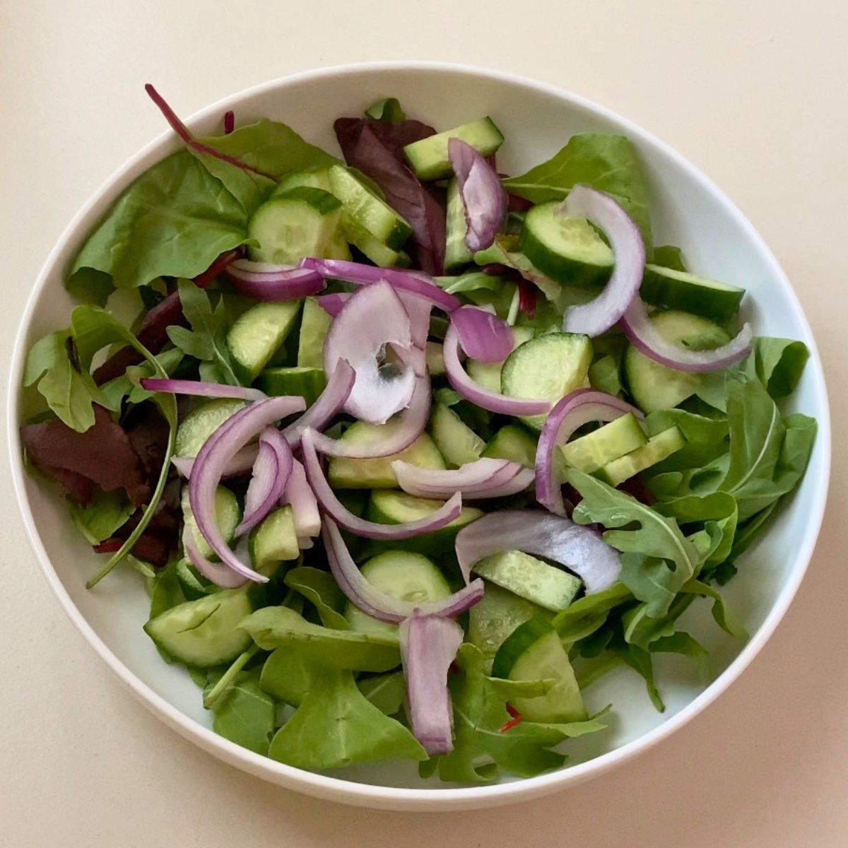 Fresh salad with garden peaches.
