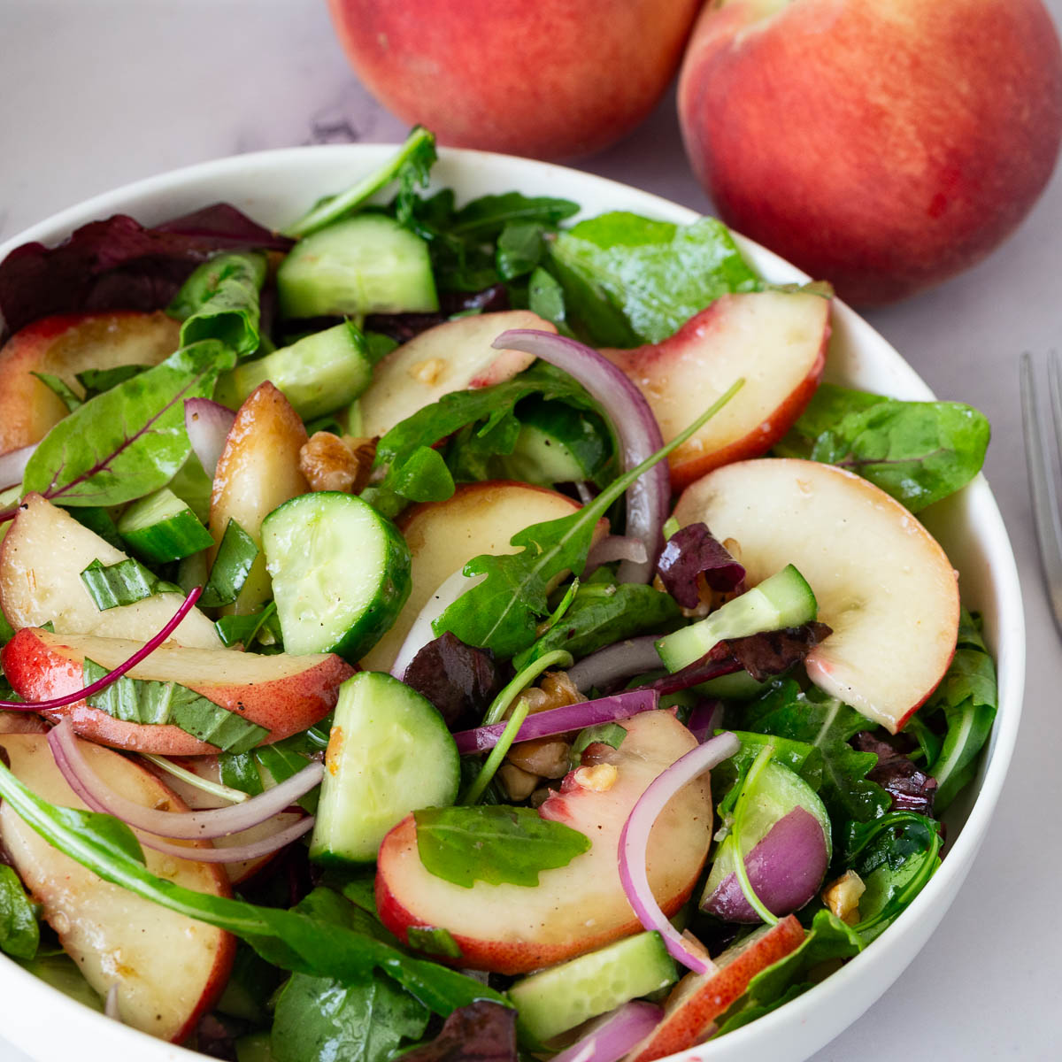Fresh peach salad on the table .