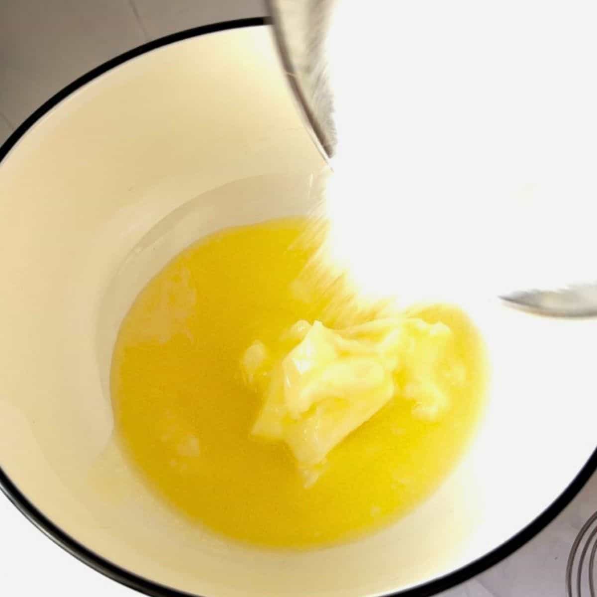 Cream butter and sugar in a bowl.