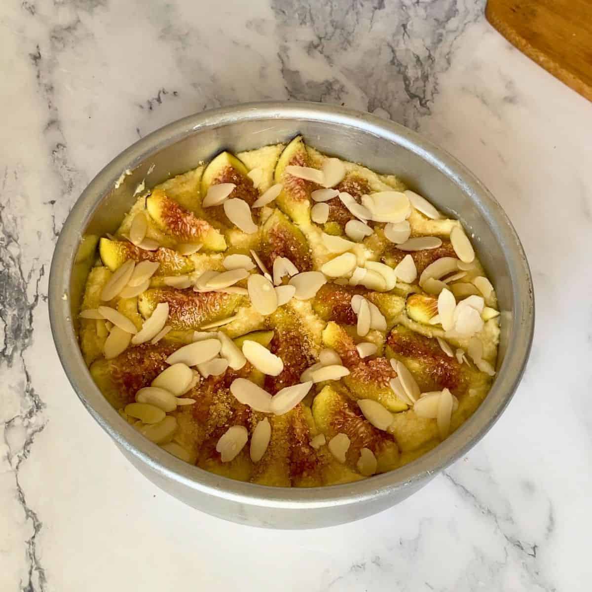 Cake pan with almond fig cake.