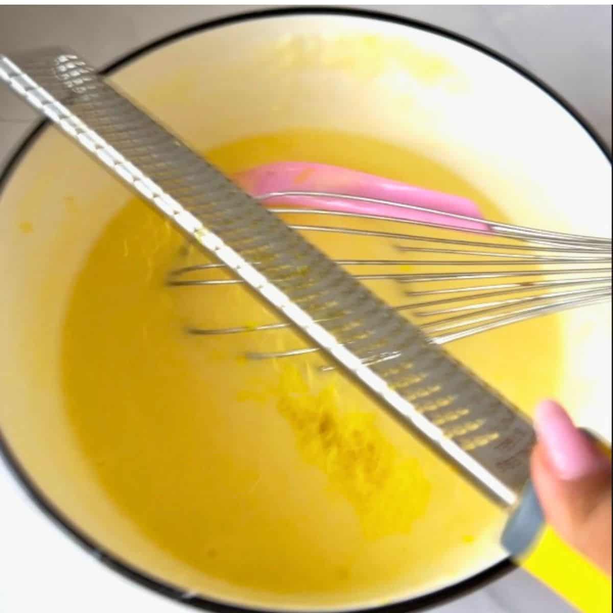 Add lemon zest to the almond cake.