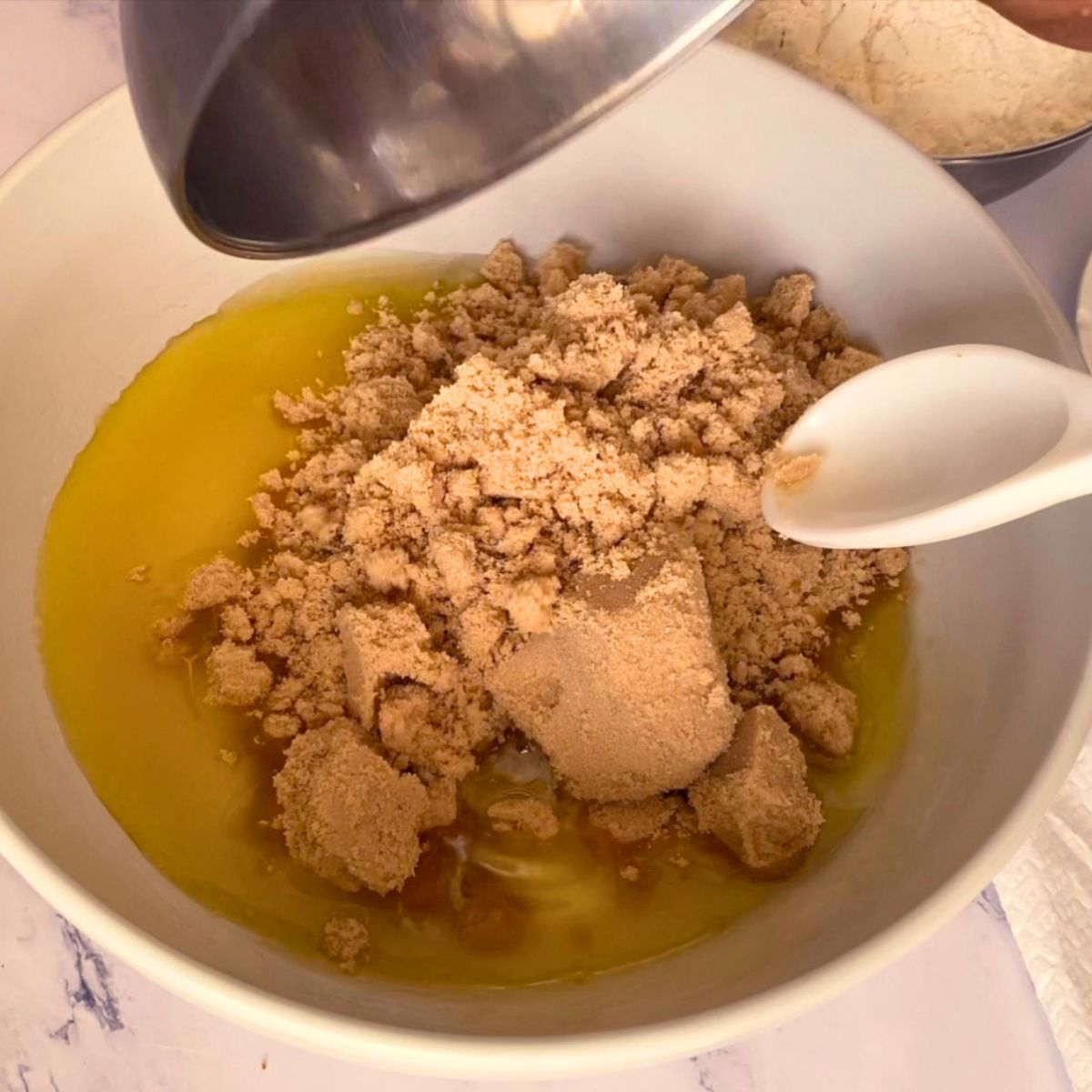 A bowl with melted butter and brown sugar.