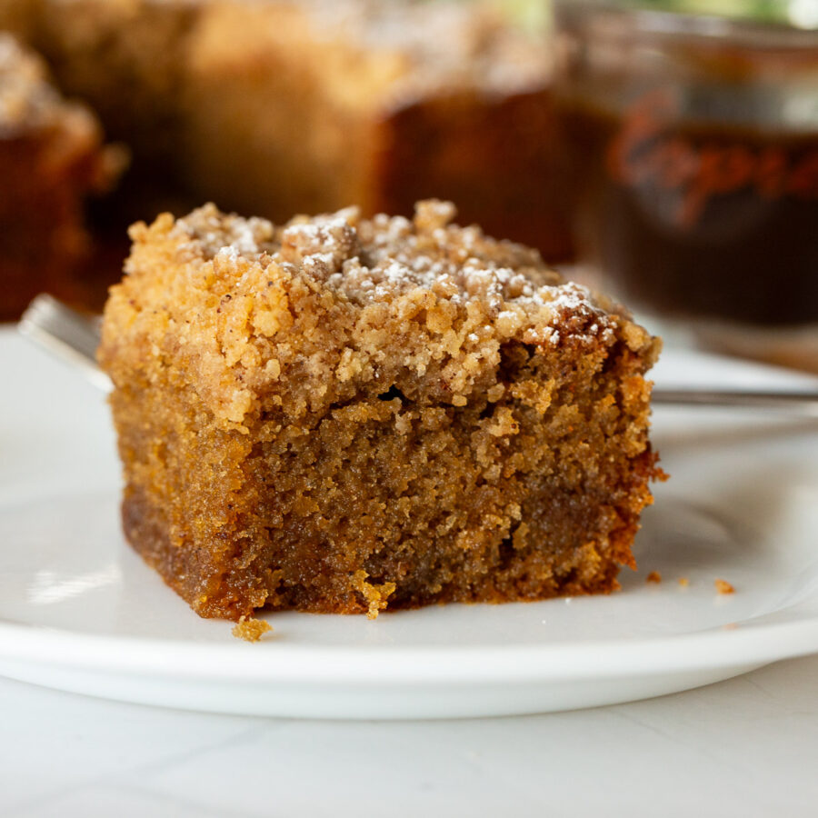 A slice of coffee cake with streusel.