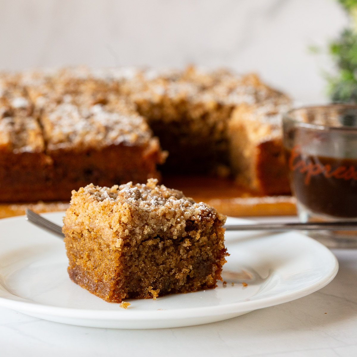 A slice of coffee cake on table.
