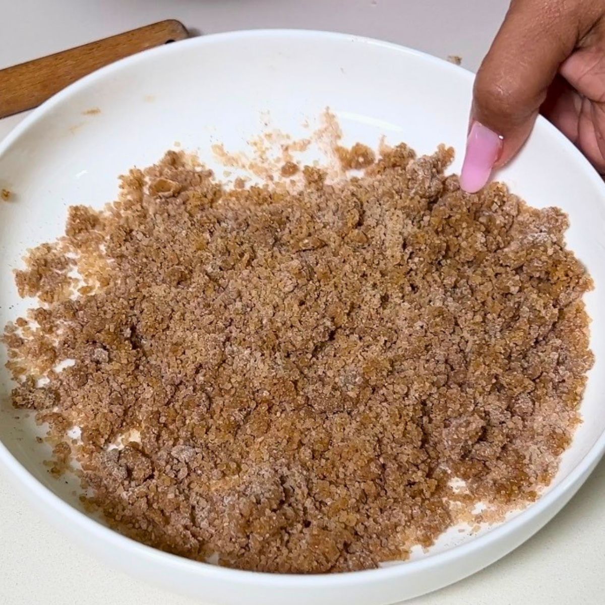 A cinnamon streusel in a bowl.