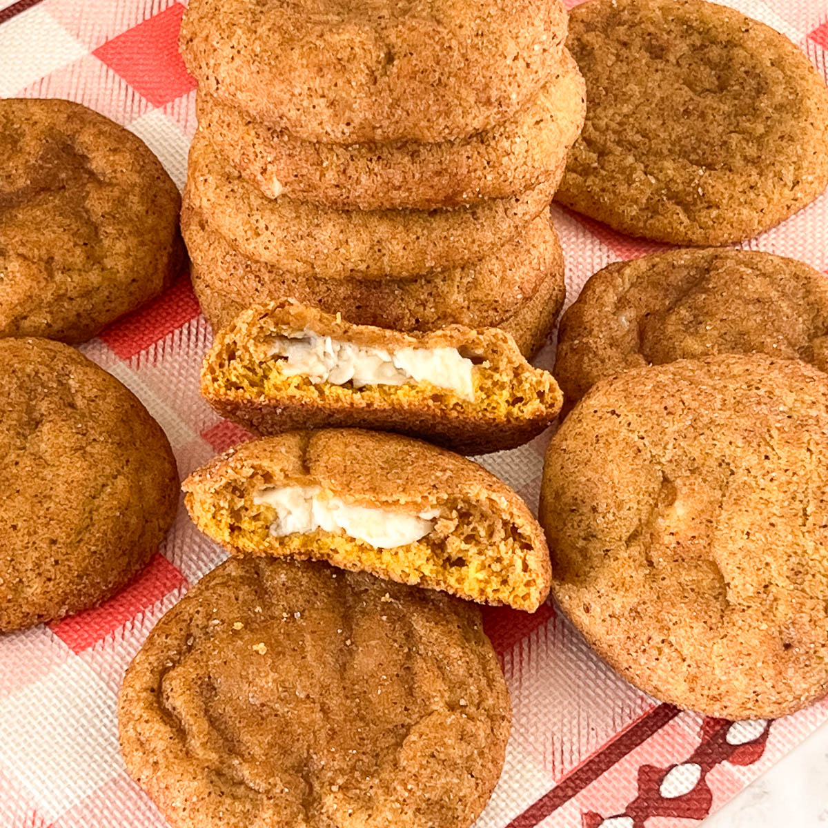 A stack of pumpkin cream cheese cookies.