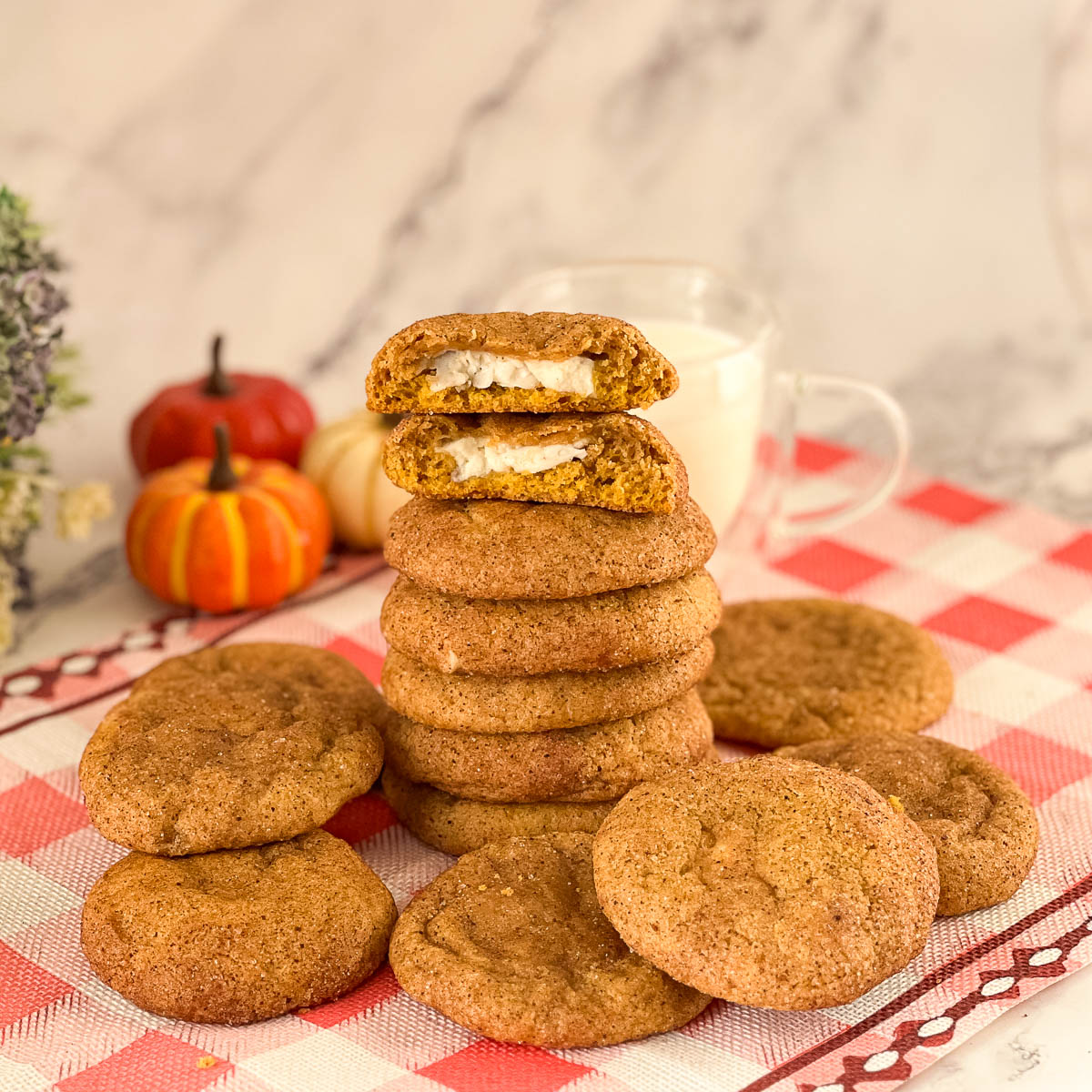A stack of pumpkin cream cheese cookies.