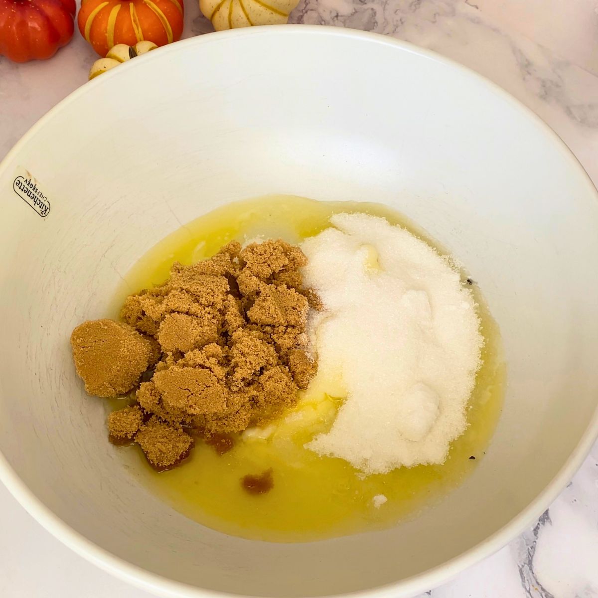 Cream butter and sugars in a bowl.