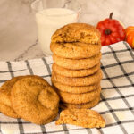 A stack of snickerdoodle cookies on the table.