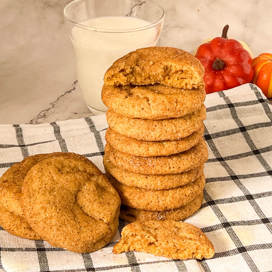 A stack of snickerdoodle cookies on the table.