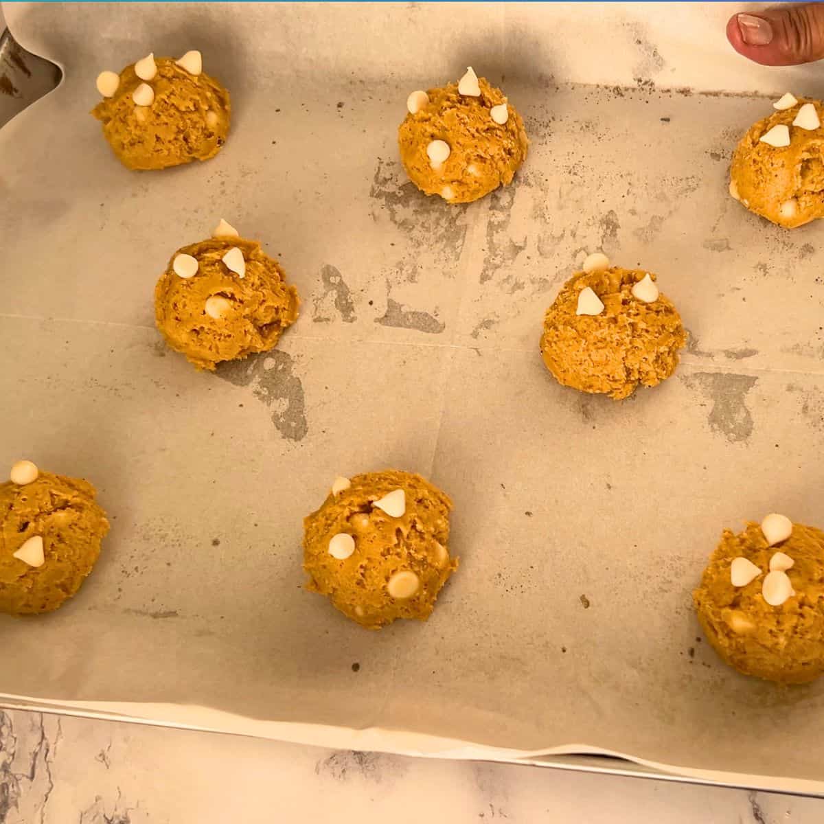 White chocolate chip pumpkin cookies ready for baking.