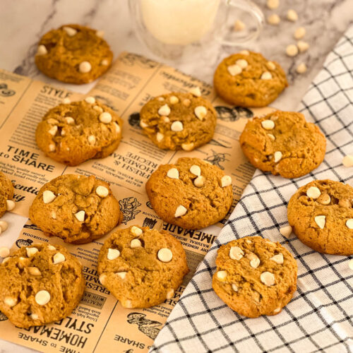 Fresh baked chocolate chip pumpkin cookies. on the table.