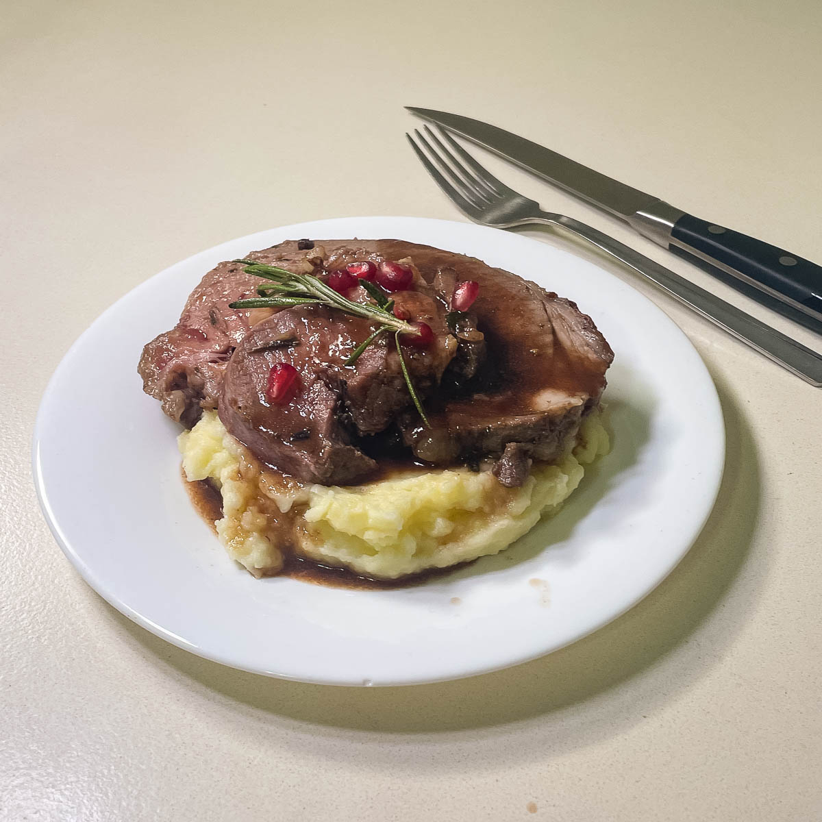 Roast Lamb over mashed potatoes.