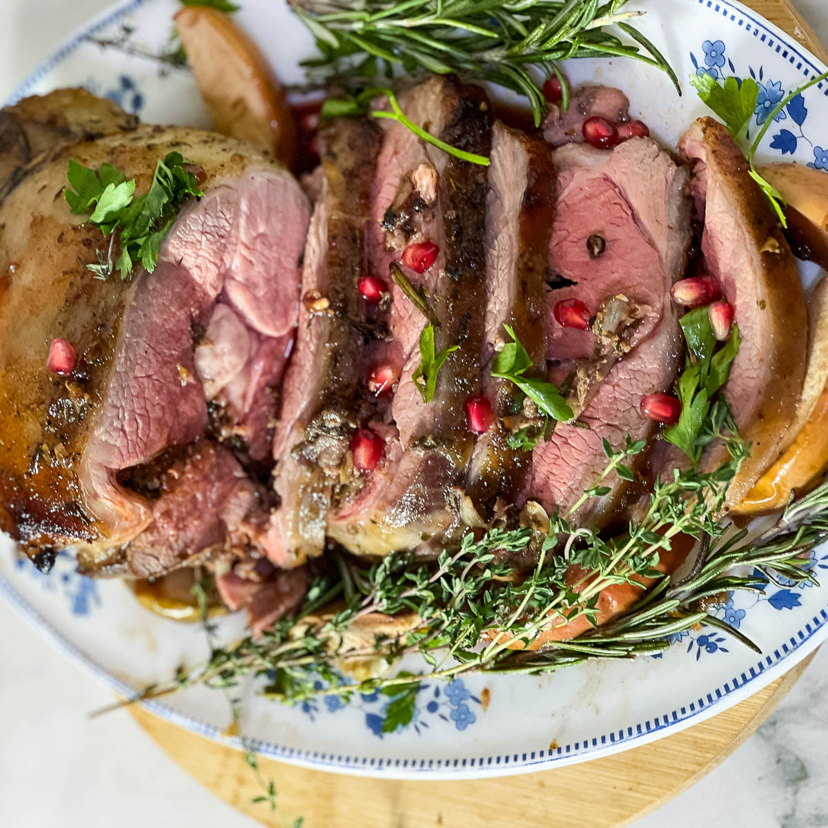 Roast boneless lamb roast slices on the platter.