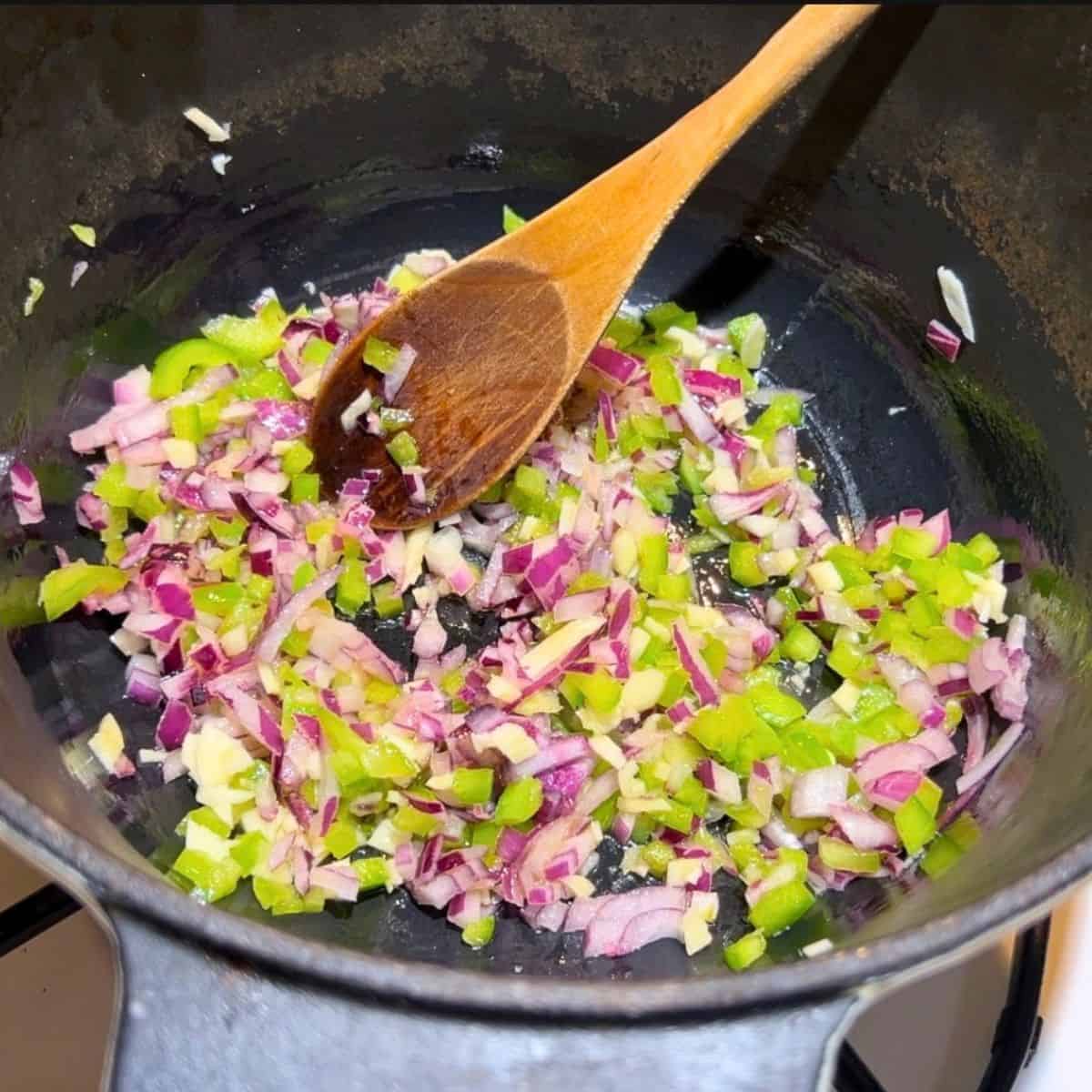Saute the veggies in a cast iron skillet.
