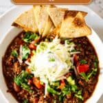 Pinterest image for Taco Soup - ground beef with beans soup.