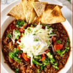 Pinterest image for Taco Soup - ground beef with beans soup.